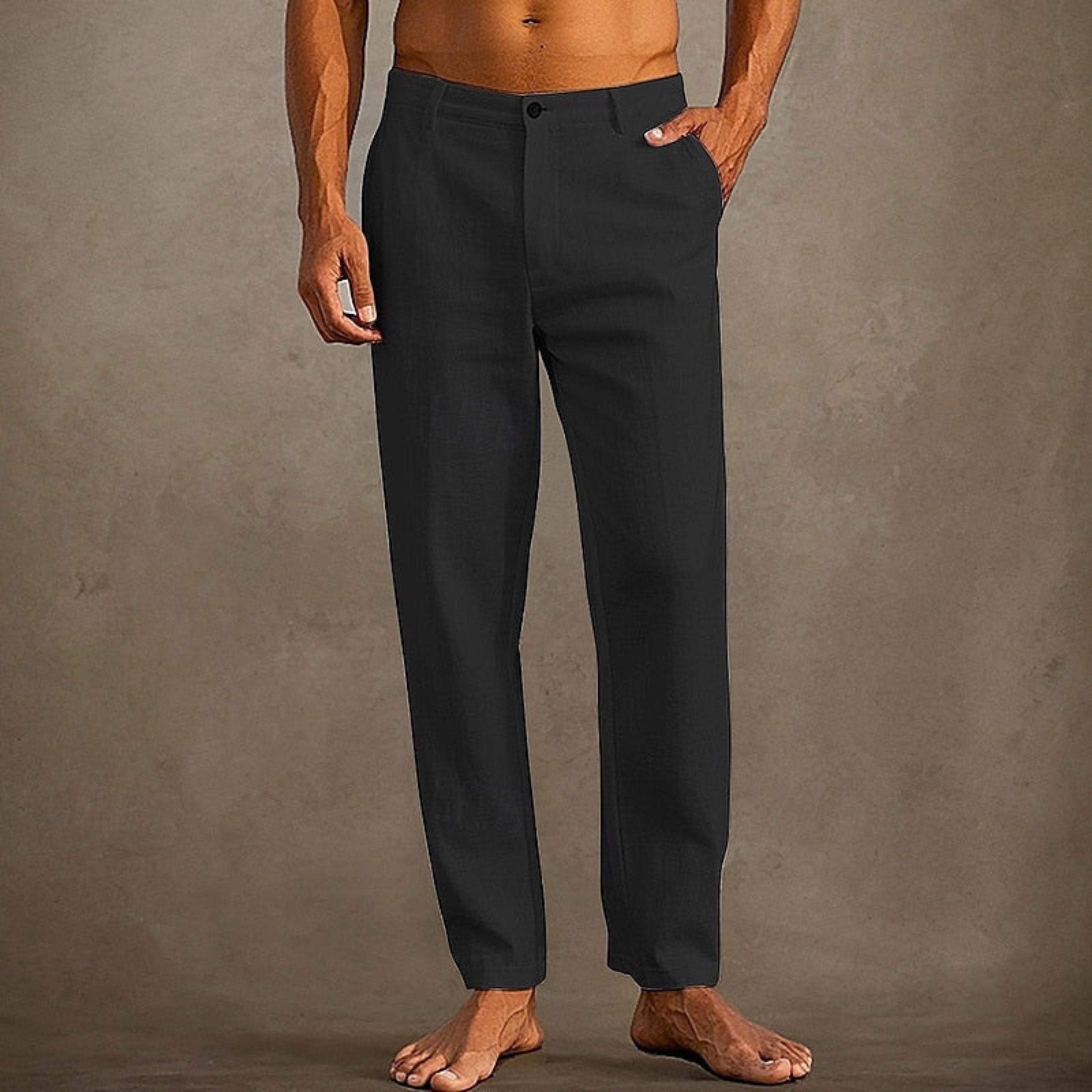 Pantalon d'été pour homme décontracté à coupe classique, tissu léger et fluide, adapté aux journées chaudes.