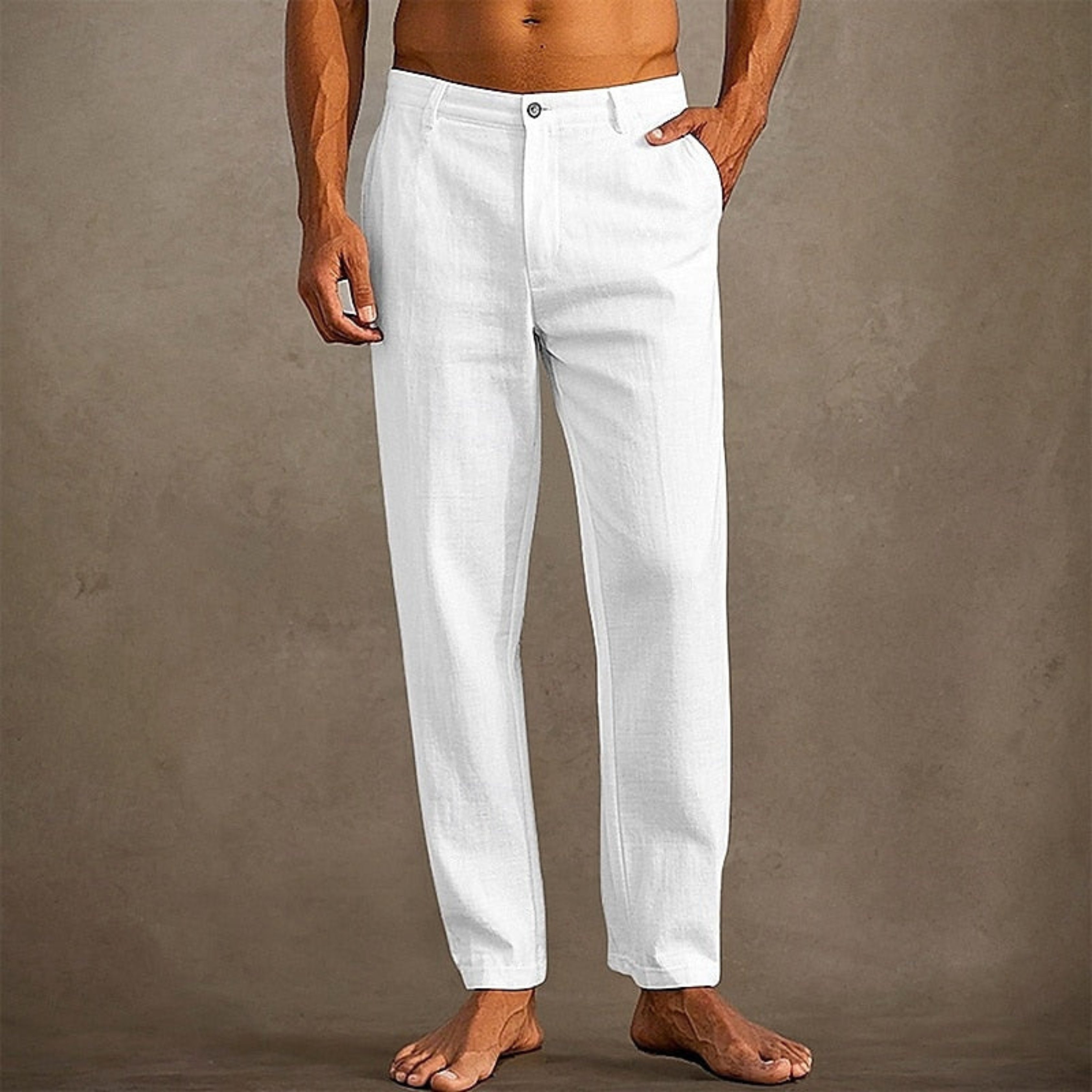 Pantalon d'été pour homme décontracté à coupe classique, tissu léger et fluide, adapté aux journées chaudes.