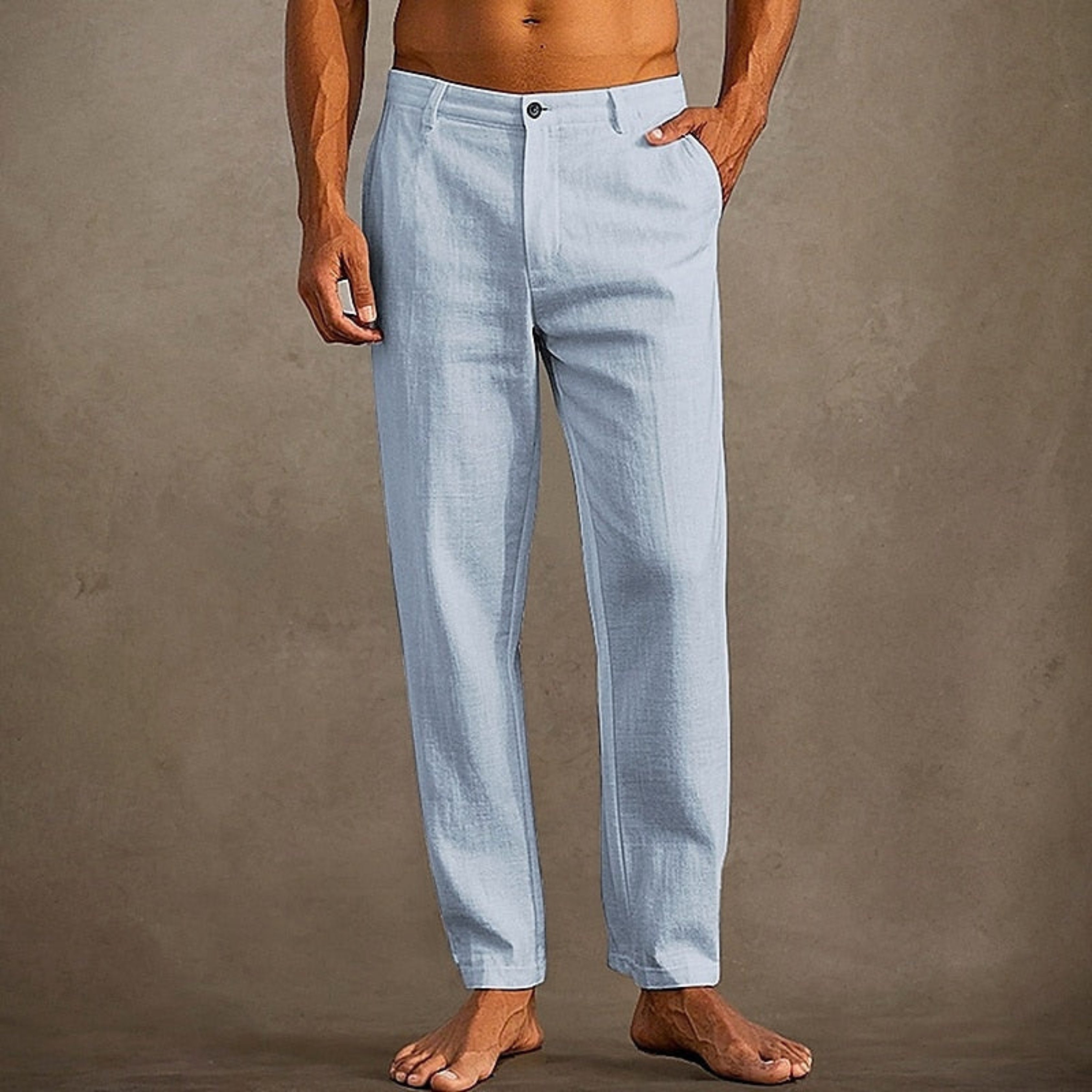 Pantalon d'été pour homme décontracté à coupe classique, tissu léger et fluide, adapté aux journées chaudes.