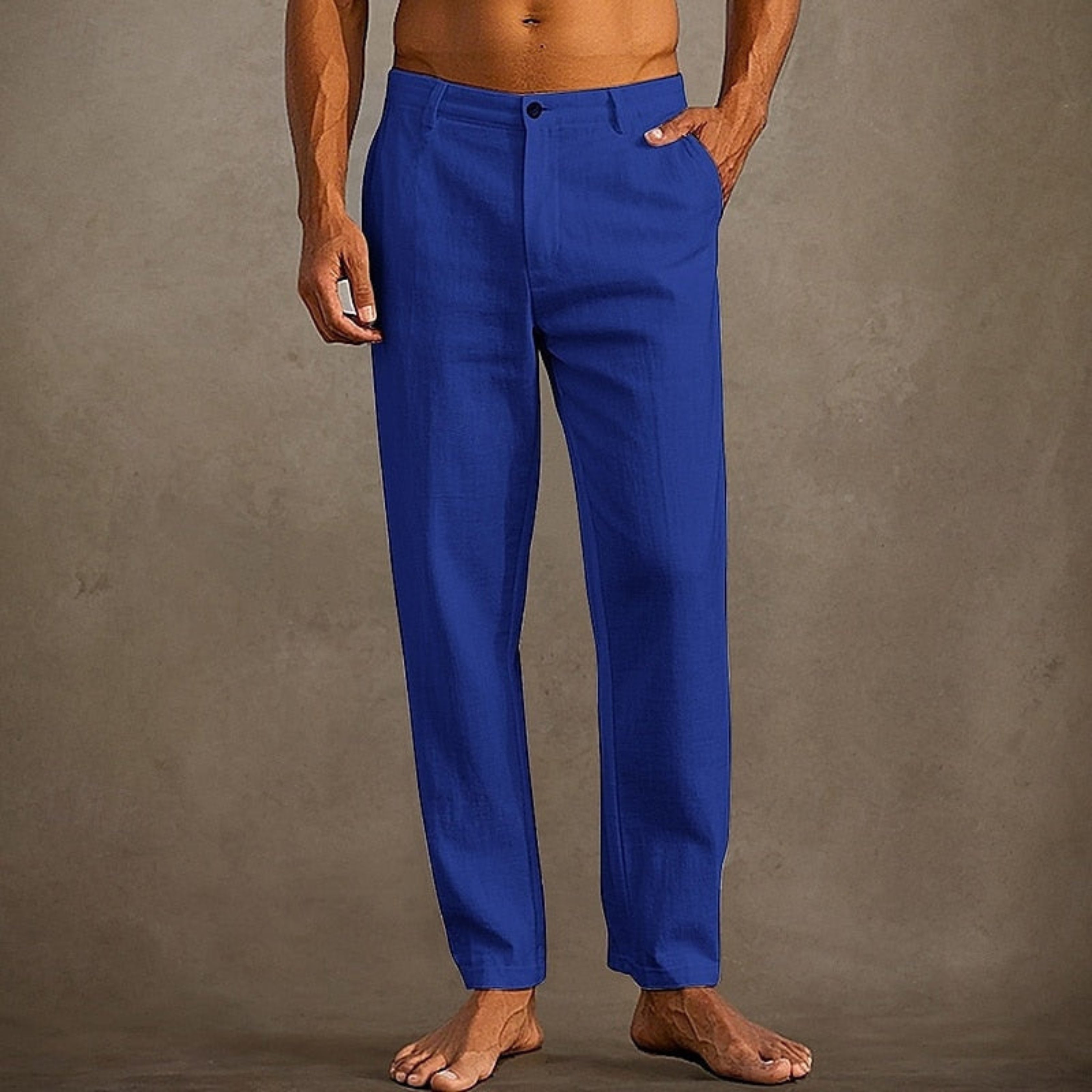 Pantalon d'été pour homme décontracté à coupe classique, tissu léger et fluide, adapté aux journées chaudes.