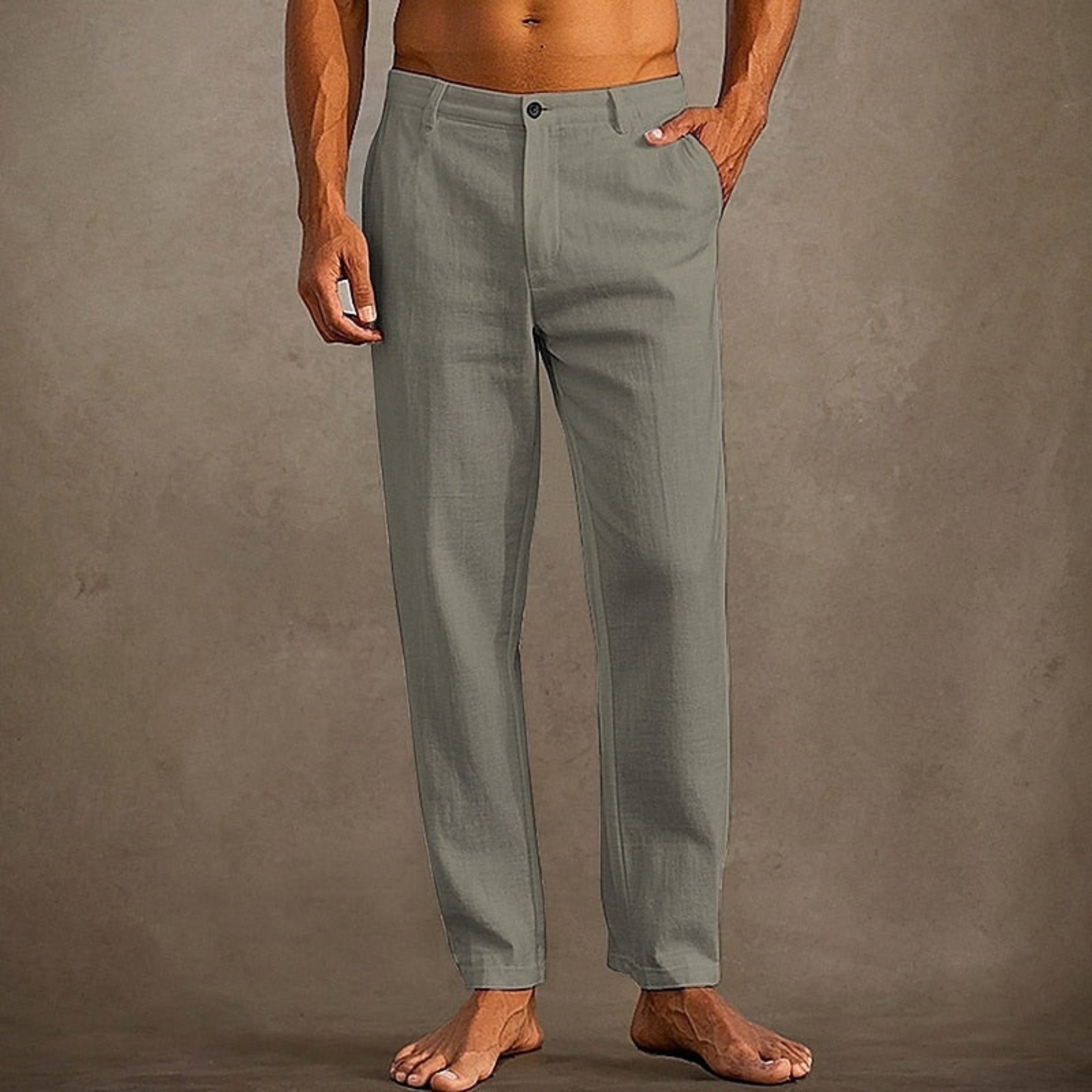 Pantalon d'été pour homme décontracté à coupe classique, tissu léger et fluide, adapté aux journées chaudes.