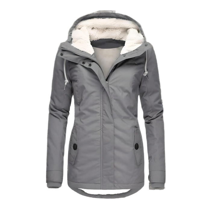 Manteau Océane long imperméable pour femme, coupe enveloppante et chaleur maintenue adaptée aux journées pluvieuses hivernales.