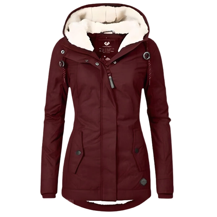 Manteau Océane long imperméable pour femme, coupe enveloppante et chaleur maintenue adaptée aux journées pluvieuses hivernales.