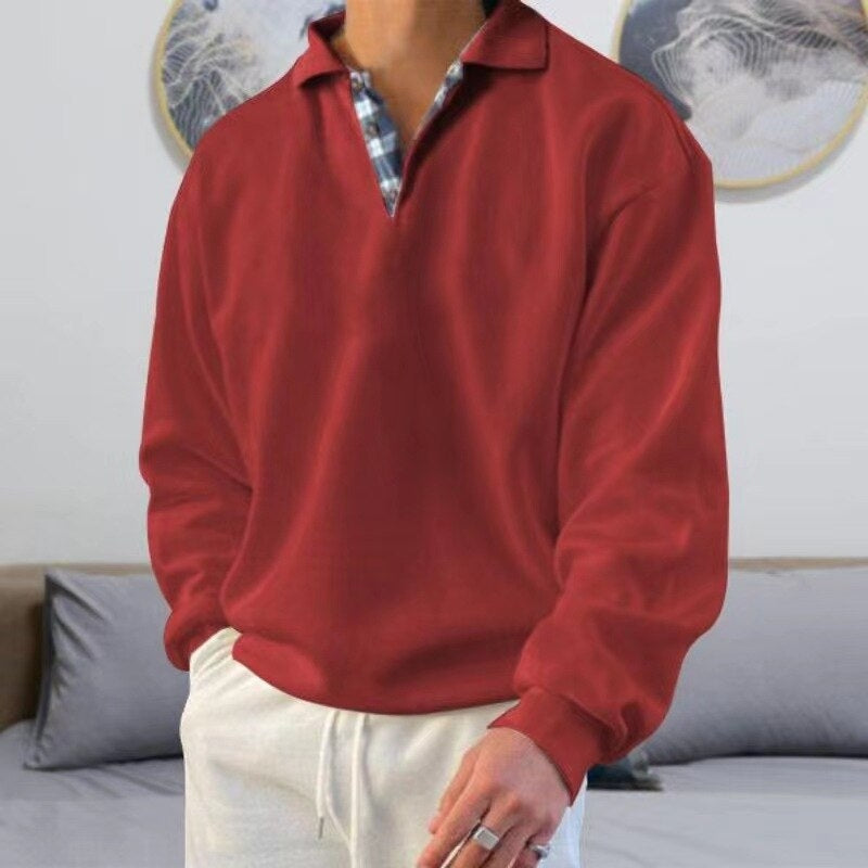 Pull léger à manches longues pour homme, de couleur rouge avec un col polo à motif carreaux. Ce modèle moderne et élégant est parfait pour un look décontracté et confortable, idéal pour les journées d'été.