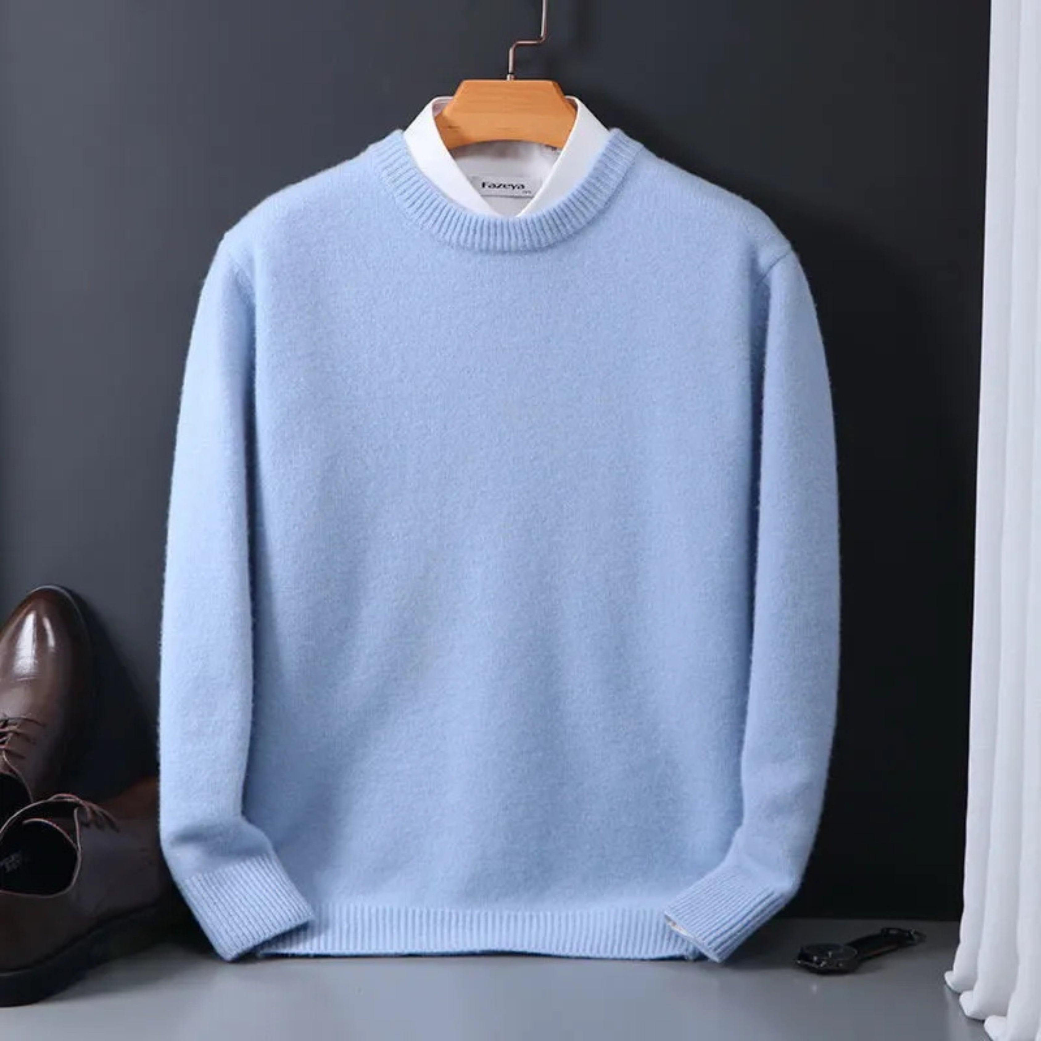 Pull Malo élégant pour homme, maille douce et coupe moderne adaptée aux tenues polyvalentes.