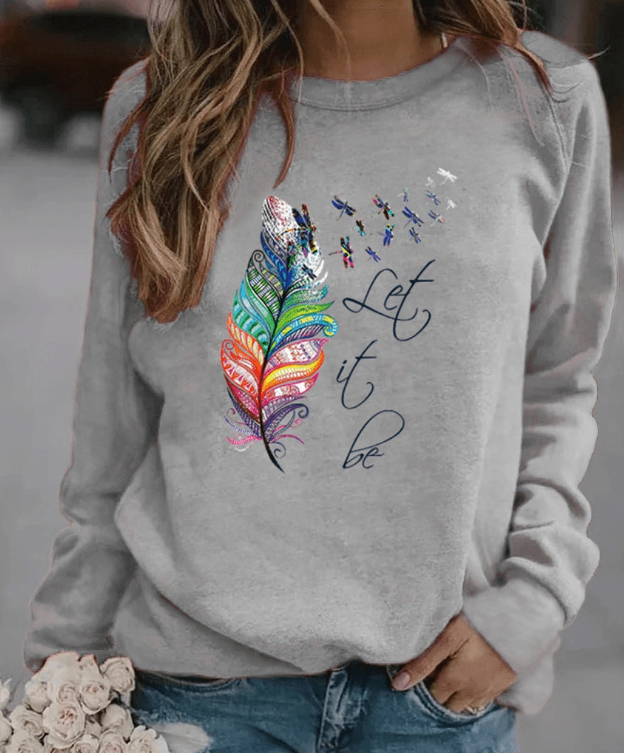 Sweatshirt Drinna hivernal pour femme avec détails plume, coupe confortable et doublure douce adaptée aux journées froides.