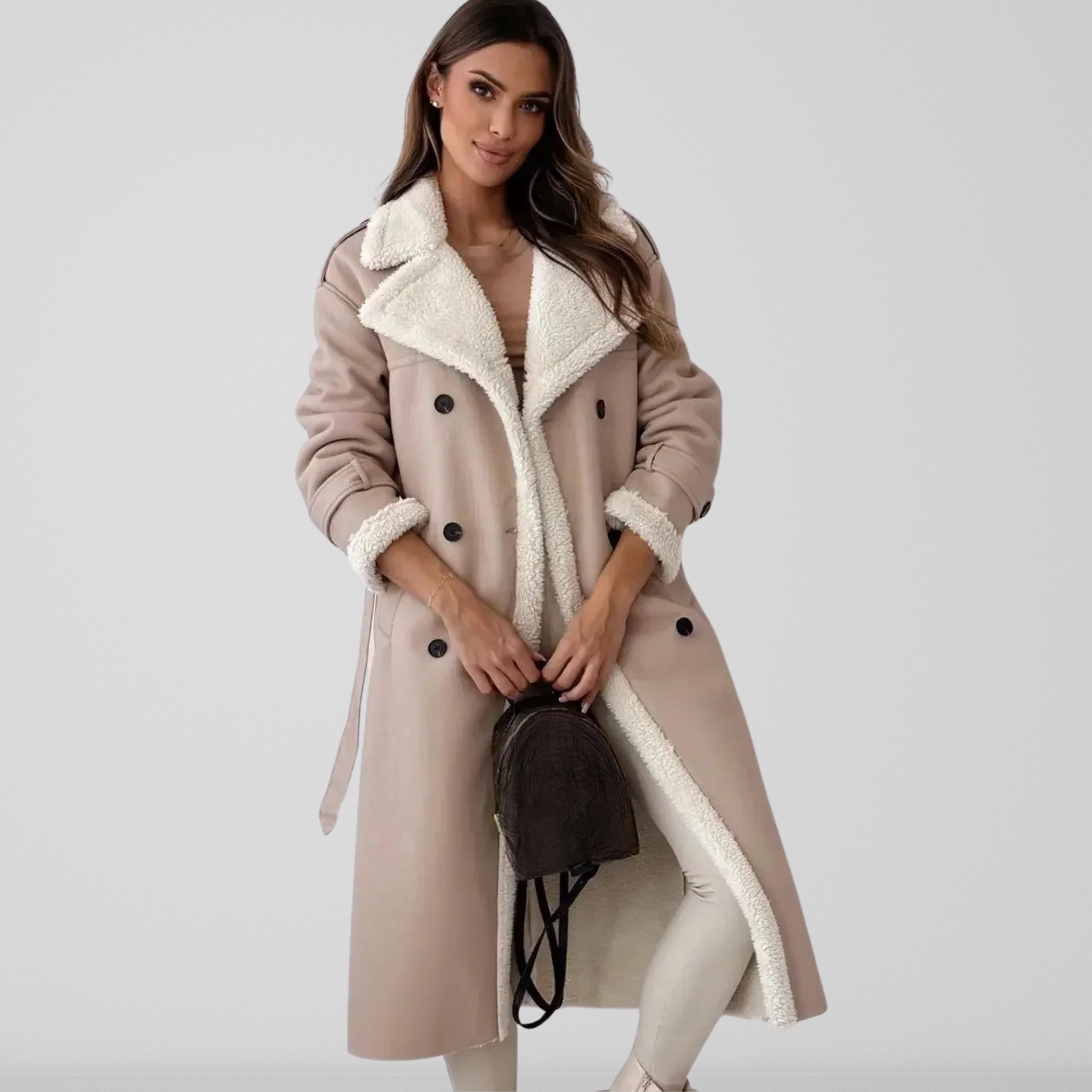 Manteau Cheryl d'hiver long pour femme, coupe élégante et chaleur maintenue adaptée aux tenues raffinées.